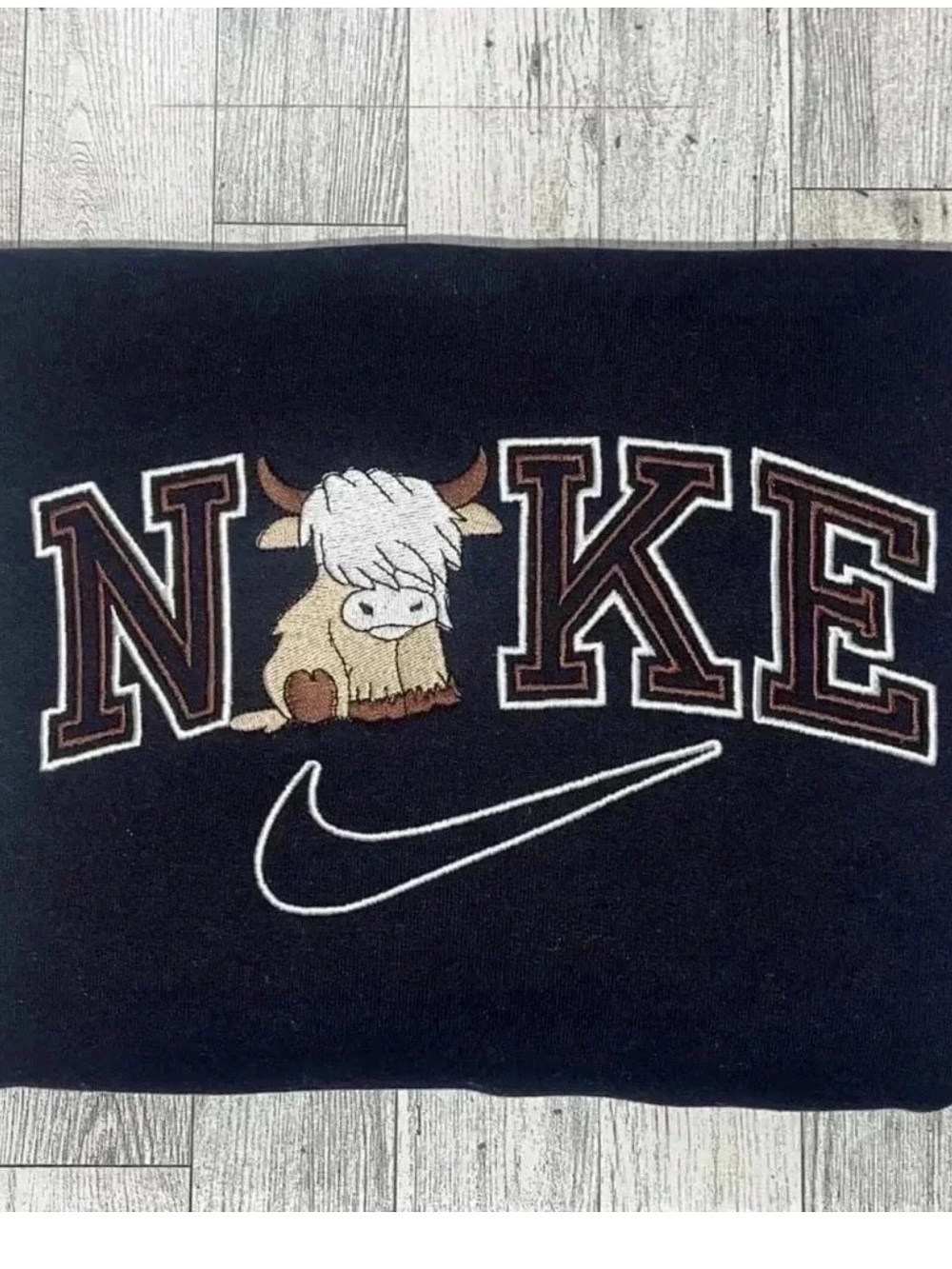 Nike Black sweatshirt with high land cow